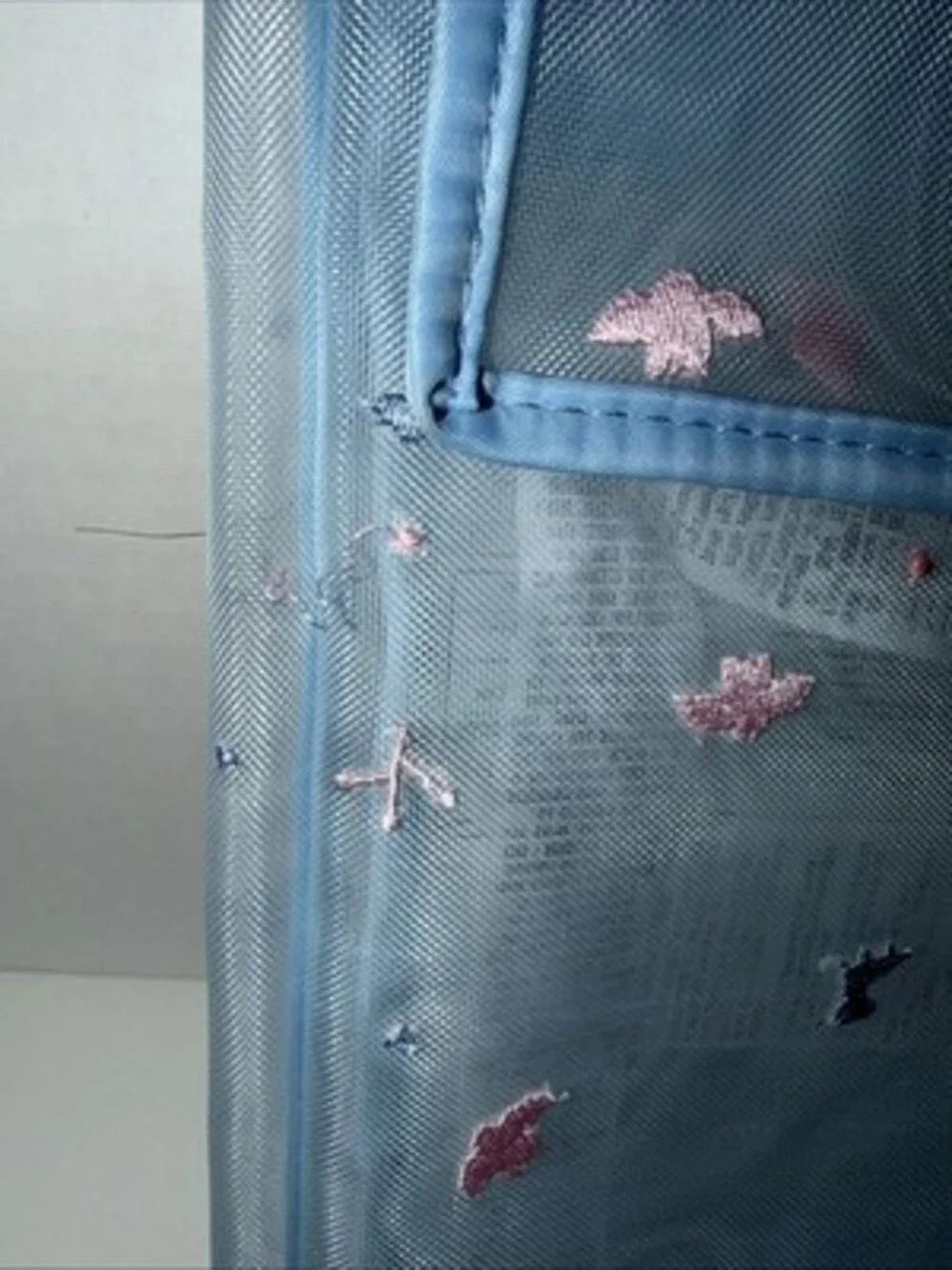 Disney Store Frozen 2 swim bag featuring a sheer mesh design and pink embroidery